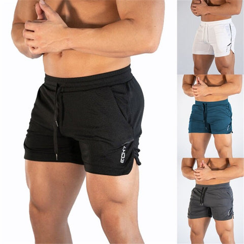 Image of 2019 männer Fitness Bodybuilding Shorts Mann Sommer Turnhallen Workout Männlichen Atmungsaktive Netz Schnell Trocken Sportswear Jogger Strand Kurze Hosen