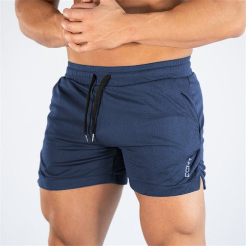 Image of 2019 männer Fitness Bodybuilding Shorts Mann Sommer Turnhallen Workout Männlichen Atmungsaktive Netz Schnell Trocken Sportswear Jogger Strand Kurze Hosen